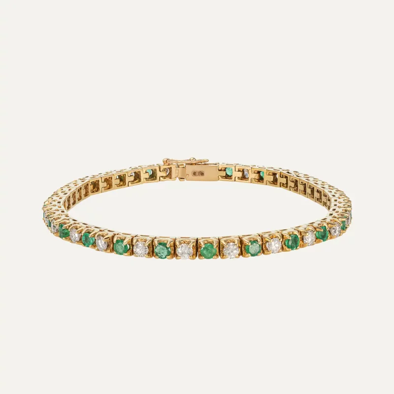 Pulseira em ouro amarelo 19,2 kt com esmeraldas naturais e diamantes intercalados