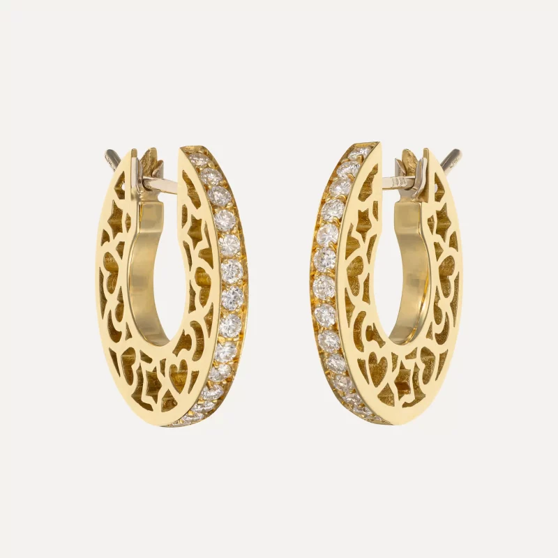 Gold hoop earrings with brilliant-cut diamonds and star motifs.