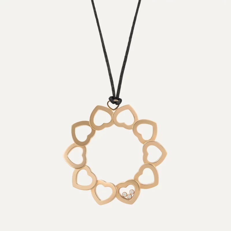 Pendente Chopard Happy Diamonds em ouro rosa com diamantes móveis